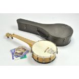 John Grey and Sons Vintage issue Ukelele with Case and spare string sets. Appears in very good to