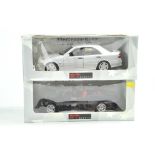 Duo of 1/18 UT Diecast vehicles comprising Mercedes and BMW. Appear excellent with boxes, boxes with