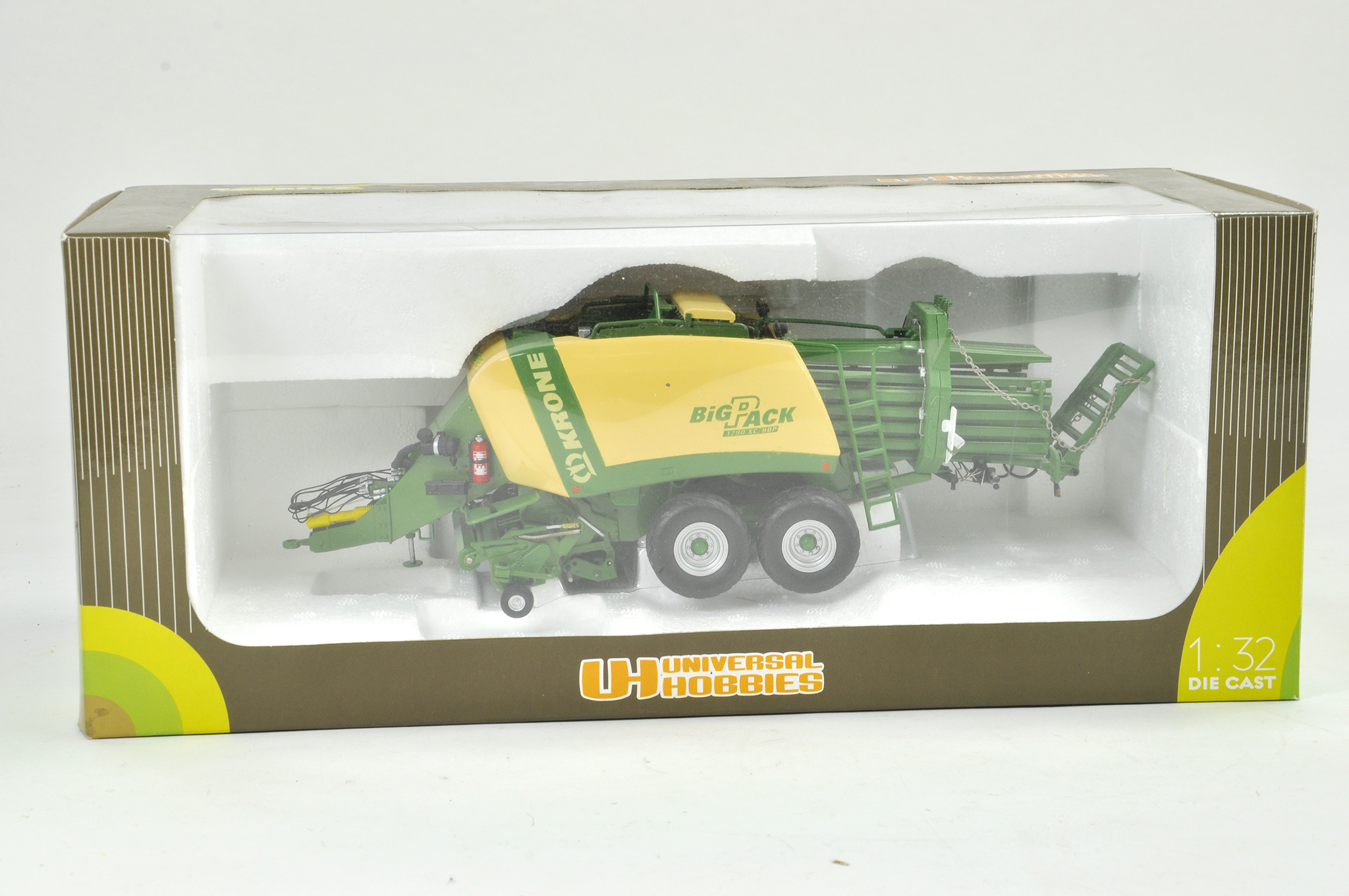 Universal Hobbies 1/32 Farm issue comprising Krone Big Pack Baler. Previously on display, the