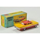 Corgi No. 480 Chevrolet Taxi Cab. Yellow body with red roof and spun hubs. Appears excellent with