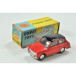 Corgi No. 216M Austin A40 with flywheel motor (works well). Red body with black roof. Grey base