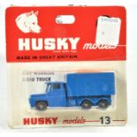 Husky unopened blister pack No. 13 Guy Warrior Sand Truck. Blue square tank and cab, silver base.