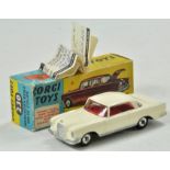 Corgi No. 230 Mercedes-Benz 220 SE Coup?. Cream body with red interior. Shaped spun wheels with