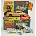 Corgi No. 261 James Bond 007 Aston Martin DB5. Gold Body with red interior, with figures. Complete