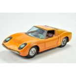 Asakusa Battery Operated Tin Plate Lamborghini Miura in orange. Good working order, some marks and