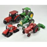 A group of mostly Ertl 1/16 Farm Tractor issues comprising Case, Oliver, McCormick plus Big Farm