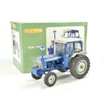 Universal Hobbies 1/16 Ford 7000 Tractor. In need of a clean and minor restoration.