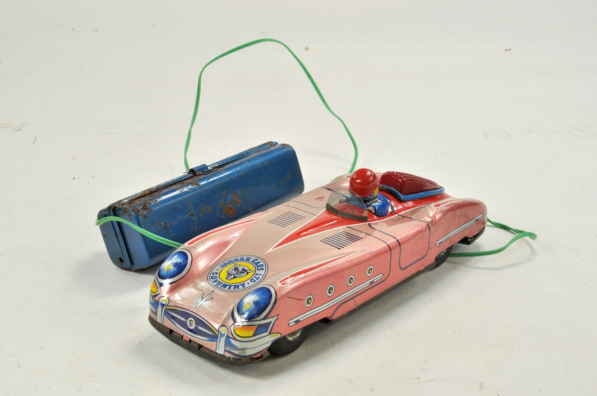 Aoshin Japanese Battery Operated tinplate issue comprising Jaguar Sports car. Battery unit
