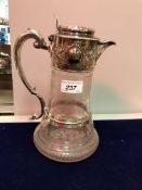 A Victorian silver mounted cut glass claret jug (by William and George Sissons, Sheffield 1862),