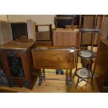 A circa 1900 oak coal purdonium, the front set with copper panel in the Art Nouveau taste,