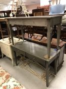 A pair of modern silvered two drawer side tables on square tapered legs, 130 cm wide x 53.