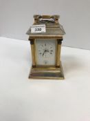 A mid-19th century carriage clock in architectural silver plated and lacquered brass case,