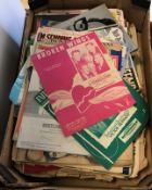 Two boxes containing various sheet music and music brochures,