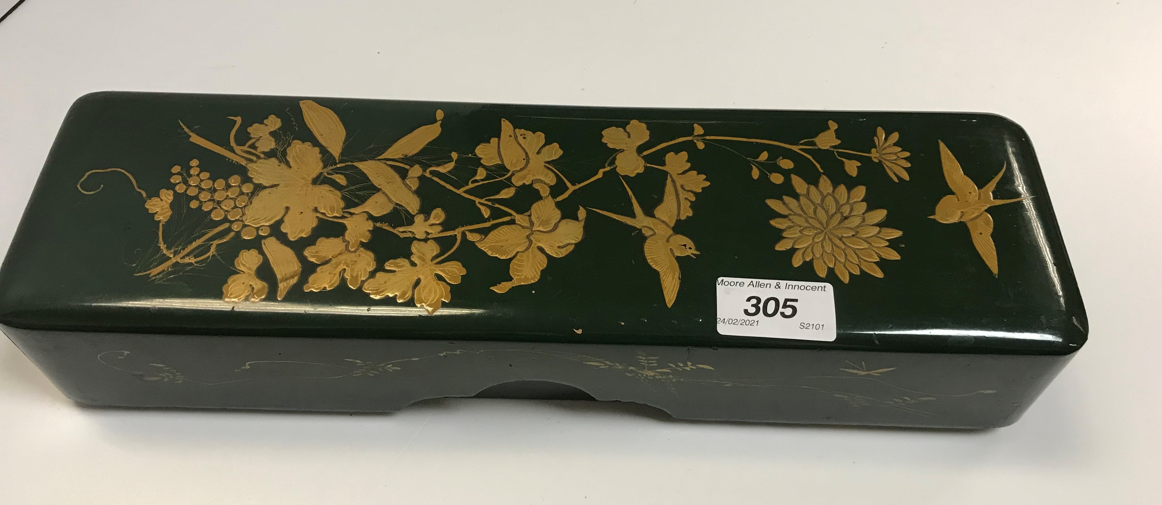 A Japanese green and gilt lacquered glove box,