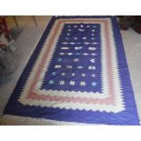 A pair of blue ground Kelim rugs, with pink and cream borders,