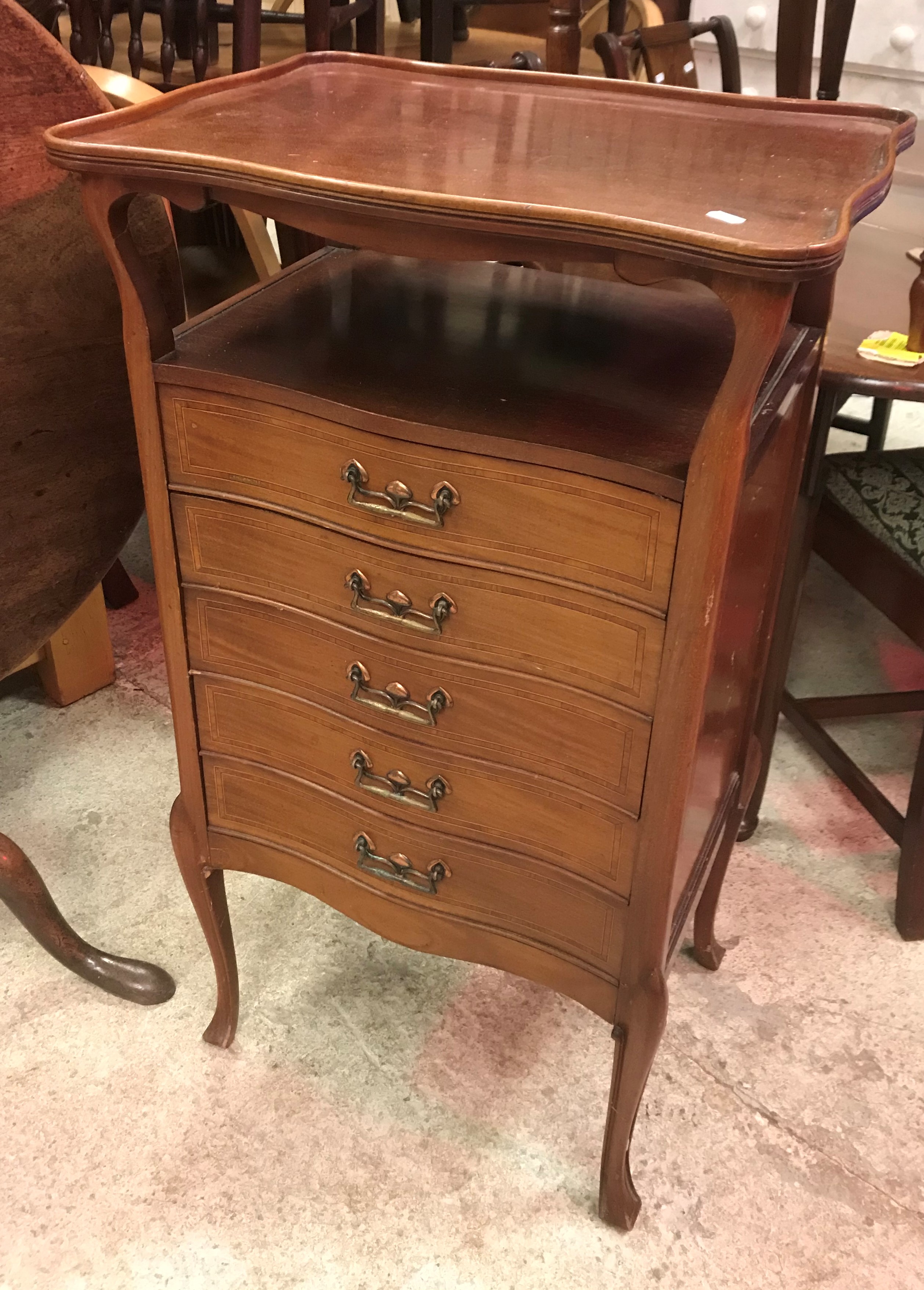 An Edwardian mahogany and inlaid music cabinet,