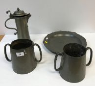 A pewter flagon,