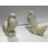 A pair of Jacques Adnet (1901-84) cream glazed pottery figures entitled “Pigeon Tête Penchée” in