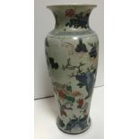 A Chinese Kangxi Period (1662-1722) famille verte vase with flared rim over a shallow baluster body
