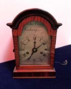 A late George III satinwood and ebony strung dome-top four glass mantel clock,