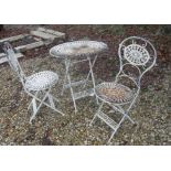 A modern cream metal painted bistro set of table and two chairs