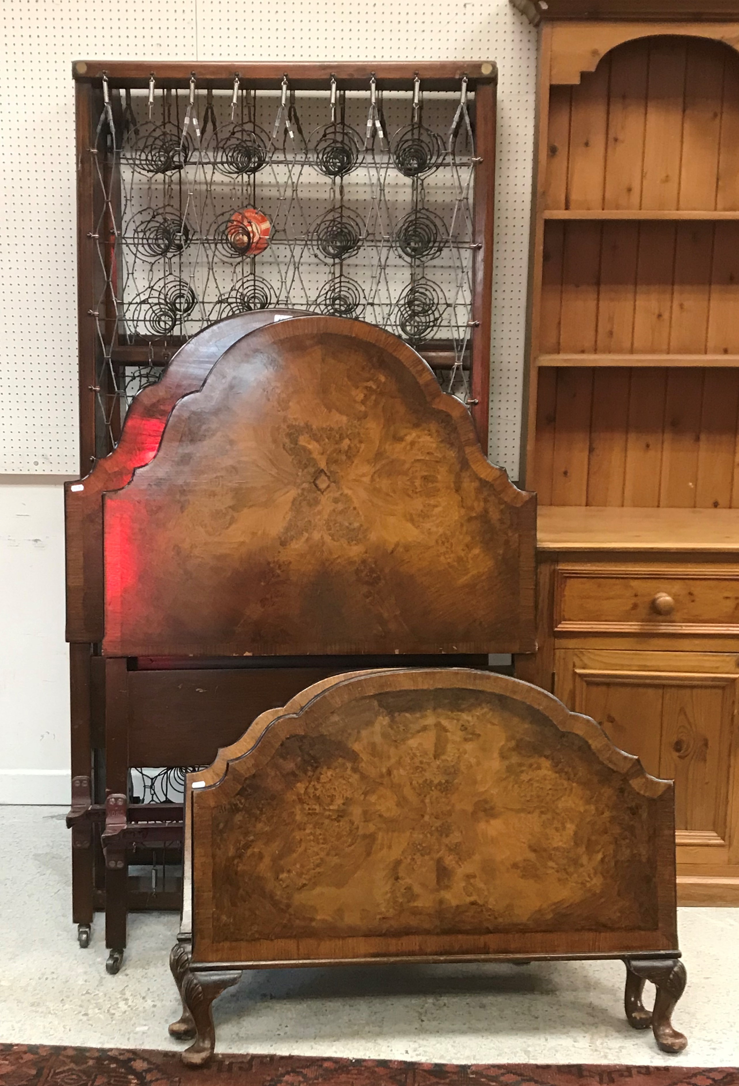 A pair of early 20th Century cross-banded walnut veneered single bedsteads, 92. - Image 2 of 2