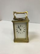 A circa 1900 lacquered brass cased carriage clock, approx 14.