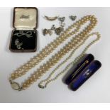 A collection of mainly costume jewellery, including single strand pearl necklace,