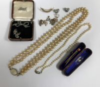 A collection of mainly costume jewellery, including single strand pearl necklace,