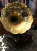 A "Success Rich Grade" table top gramophone with embossed brass horn on a square mahogany base,