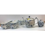 A Royal Copenhagen "Blue Half Lace" pattern tea service comprising twelve teacups and saucers,