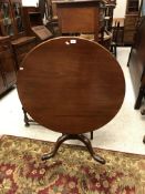 An early 19th Century mahogany tea table,