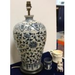 A modern blue and white baluster-shaped vase in the 19th Century Chinese taste,