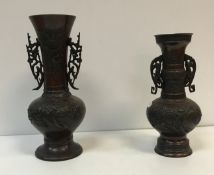 A Japanese Meiji period chocolate patinated bronze vase,