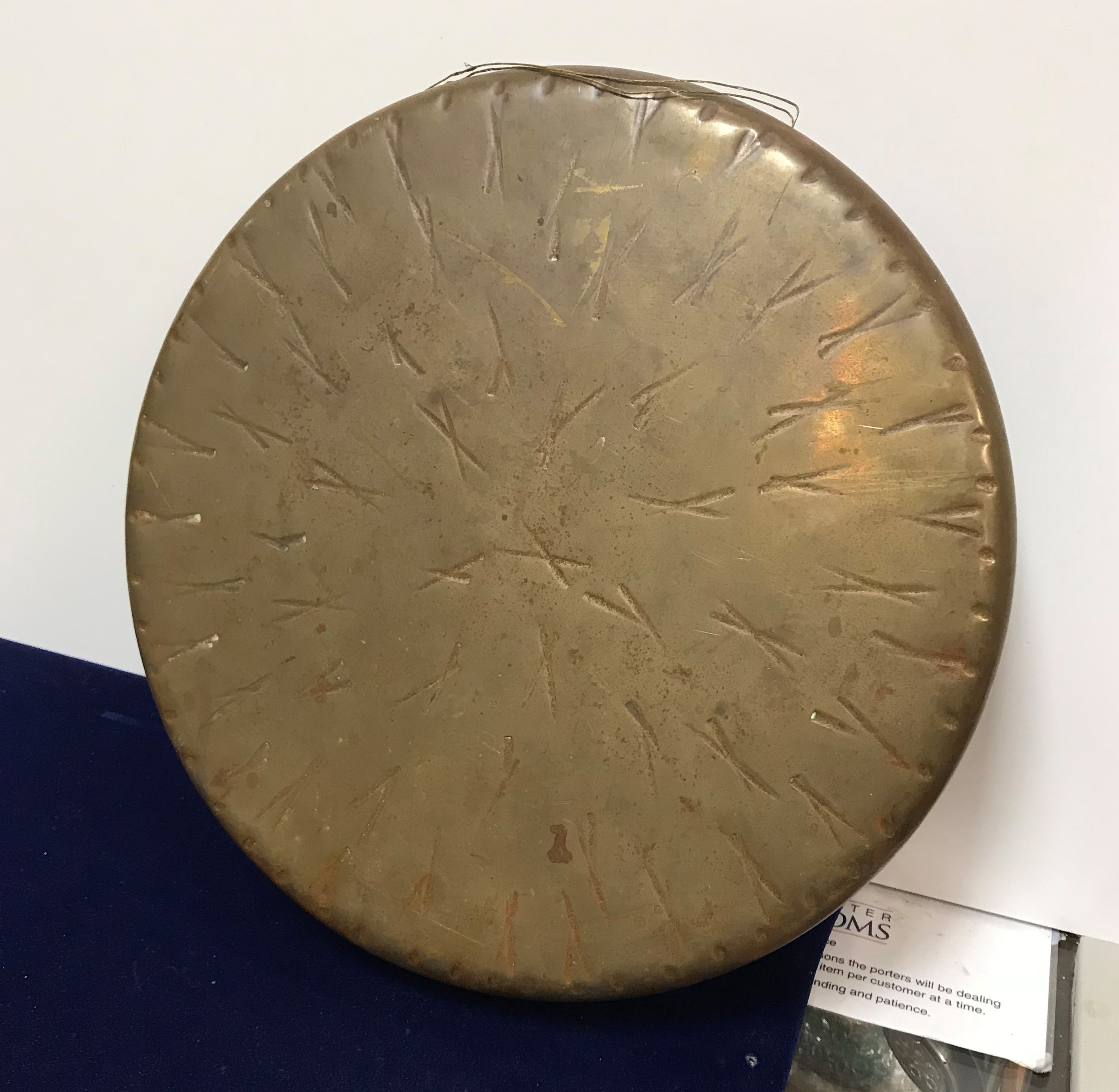 An early 20th Century beaten brass gong, 35.
