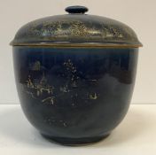 A Chinese Kangxi powder blue ground and gilt decorated pot and cover (gilding worn), 21.