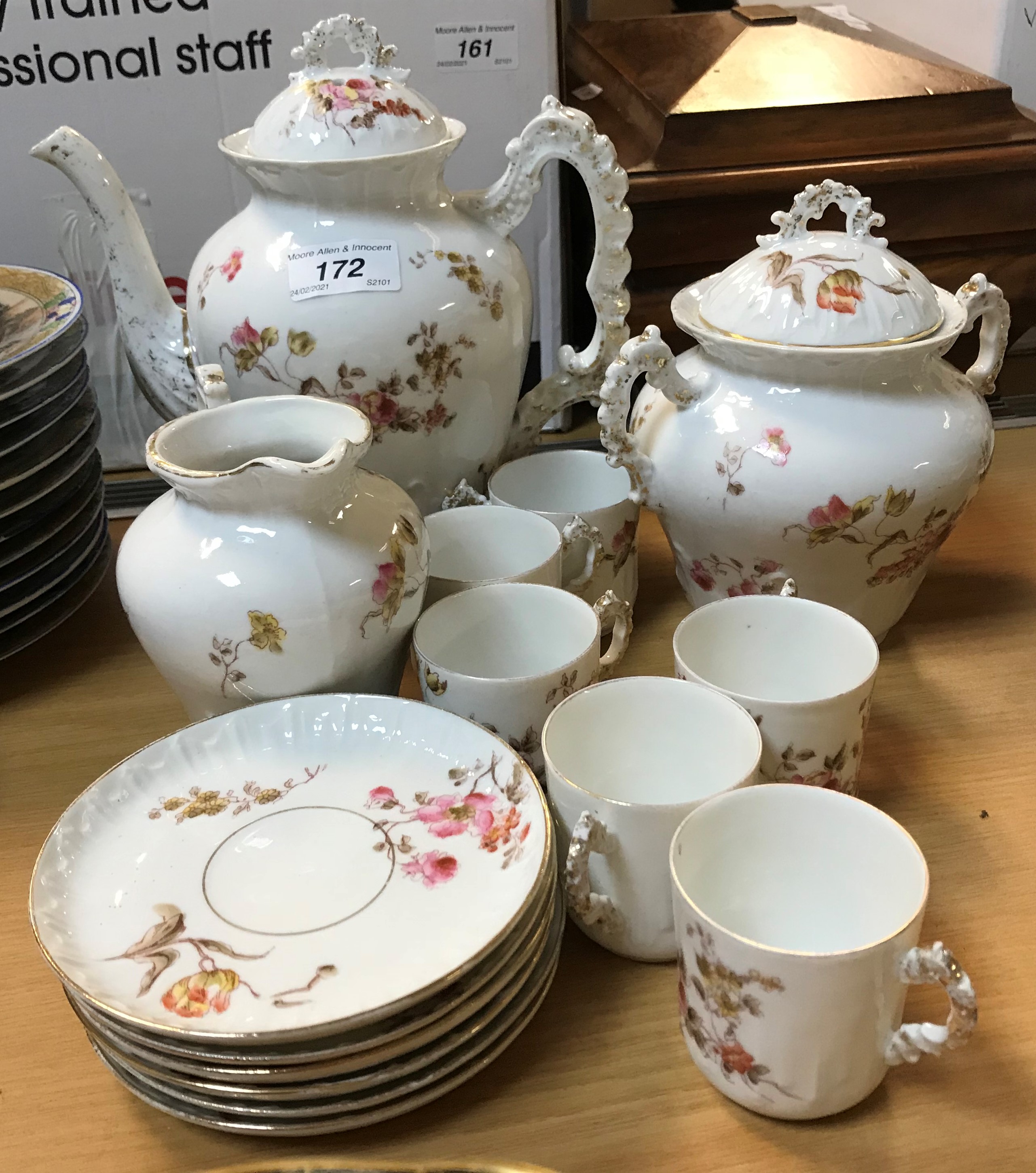 A circa 1900 French floral spray decorated coffee set comprising coffee pot,