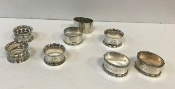 A collection of eight various silver napkin rings (various dates, makers and designs), 6.