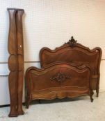 A Louis XV style walnut bedstead with mattress,