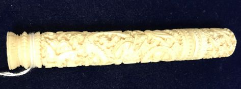 A 19th Century Chinese carved ivory bodkin case with all over dragon decoration,