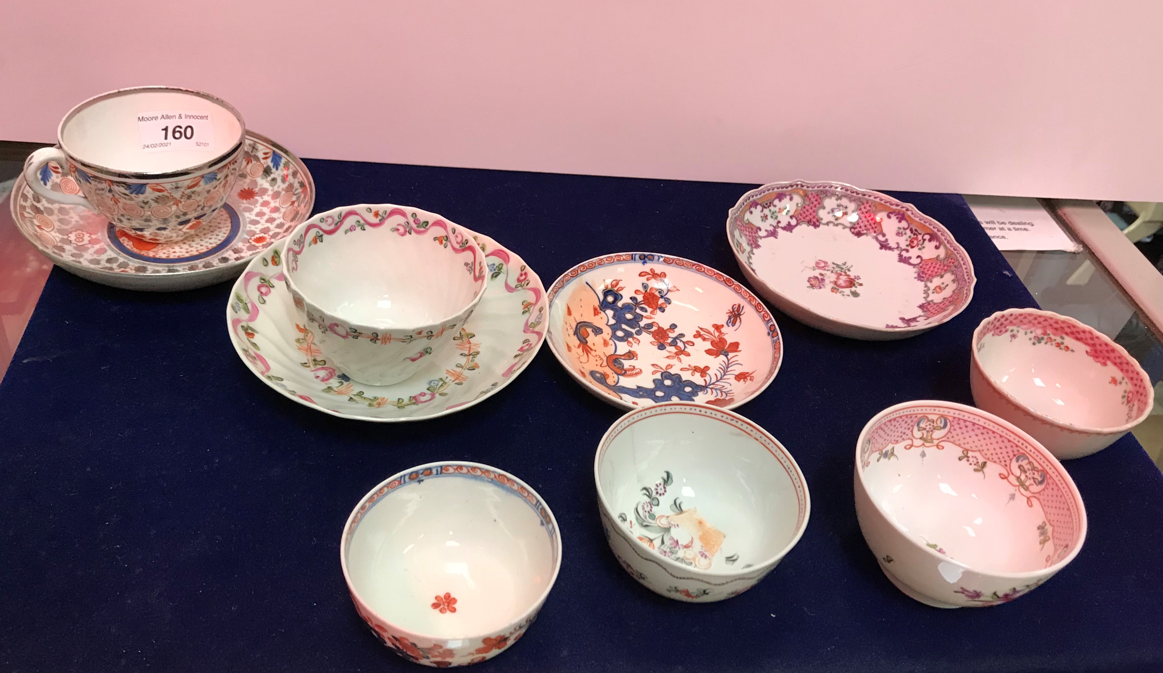 Three 19th Century polychrome decorated tea bowls and saucers,