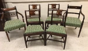 A harlequin set of six 19th Century mahogany bar back dining chairs with matching green stripe