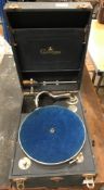 A vintage Chorister portable or tabletop gramophone in leatherette-style case