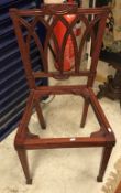 A set of twelve Indian carved hardwood framed dining chairs in the George III manner,