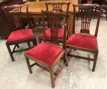 A set of four late 18th Century Provincial Chippendale mahogany dining chairs with vase shaped back