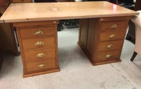 A modern stained beech and pine double pedestal desk,