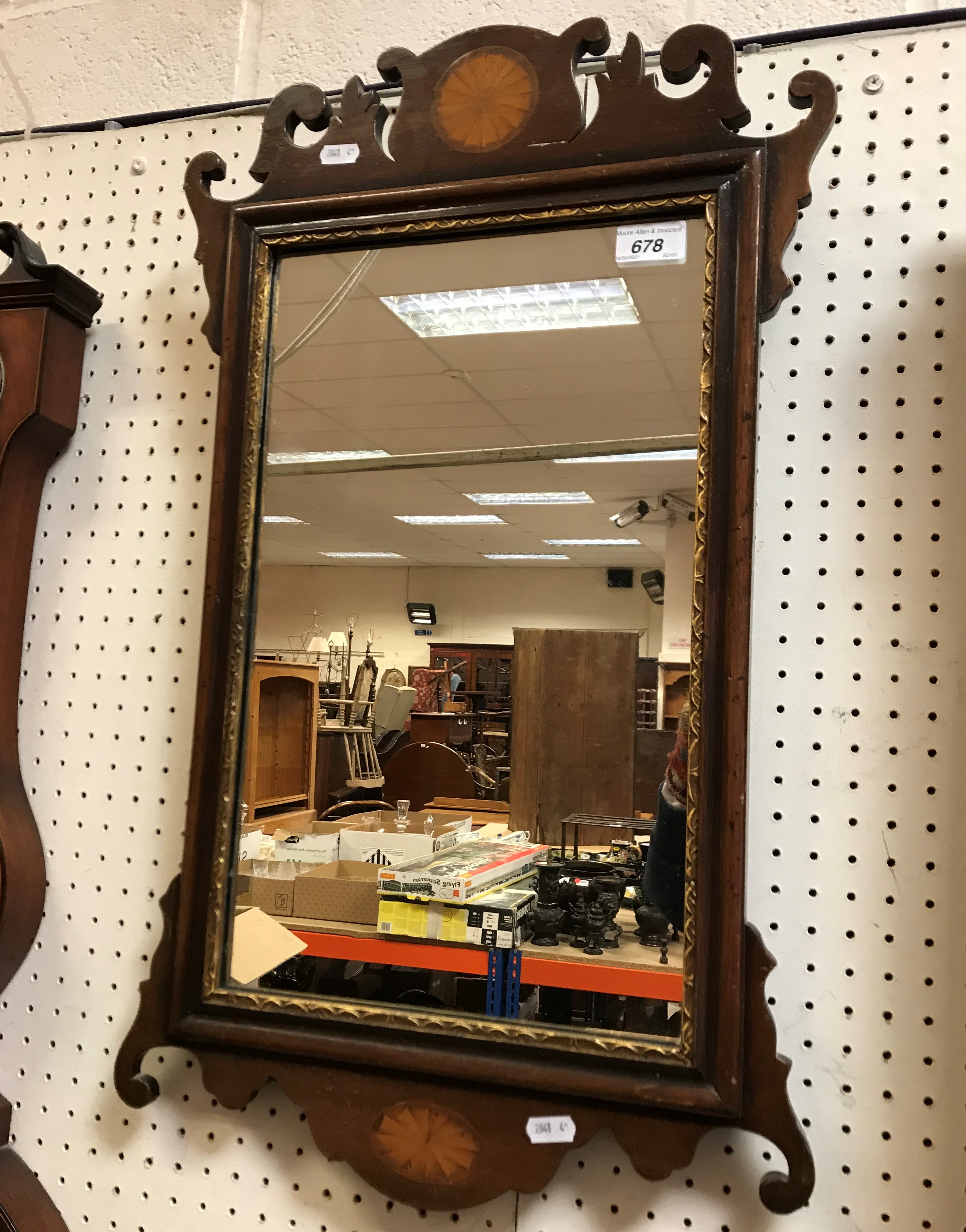 A 19th Century mahogany and inlaid wall mirror with fan decoration,