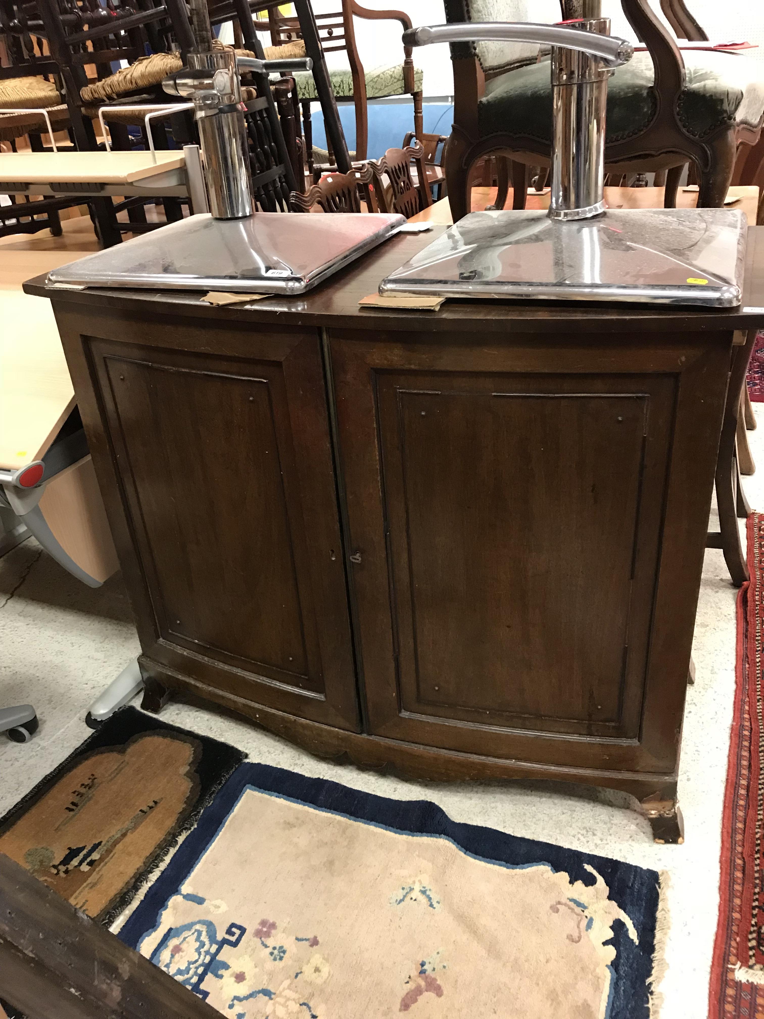 A circa 1900 mahogany bow fronted two door cupboard with single shelf,