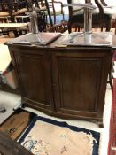 A circa 1900 mahogany bow fronted two door cupboard with single shelf,