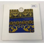 A Gianni Versace silk scarf in blue and gold signed Atelier Versace,